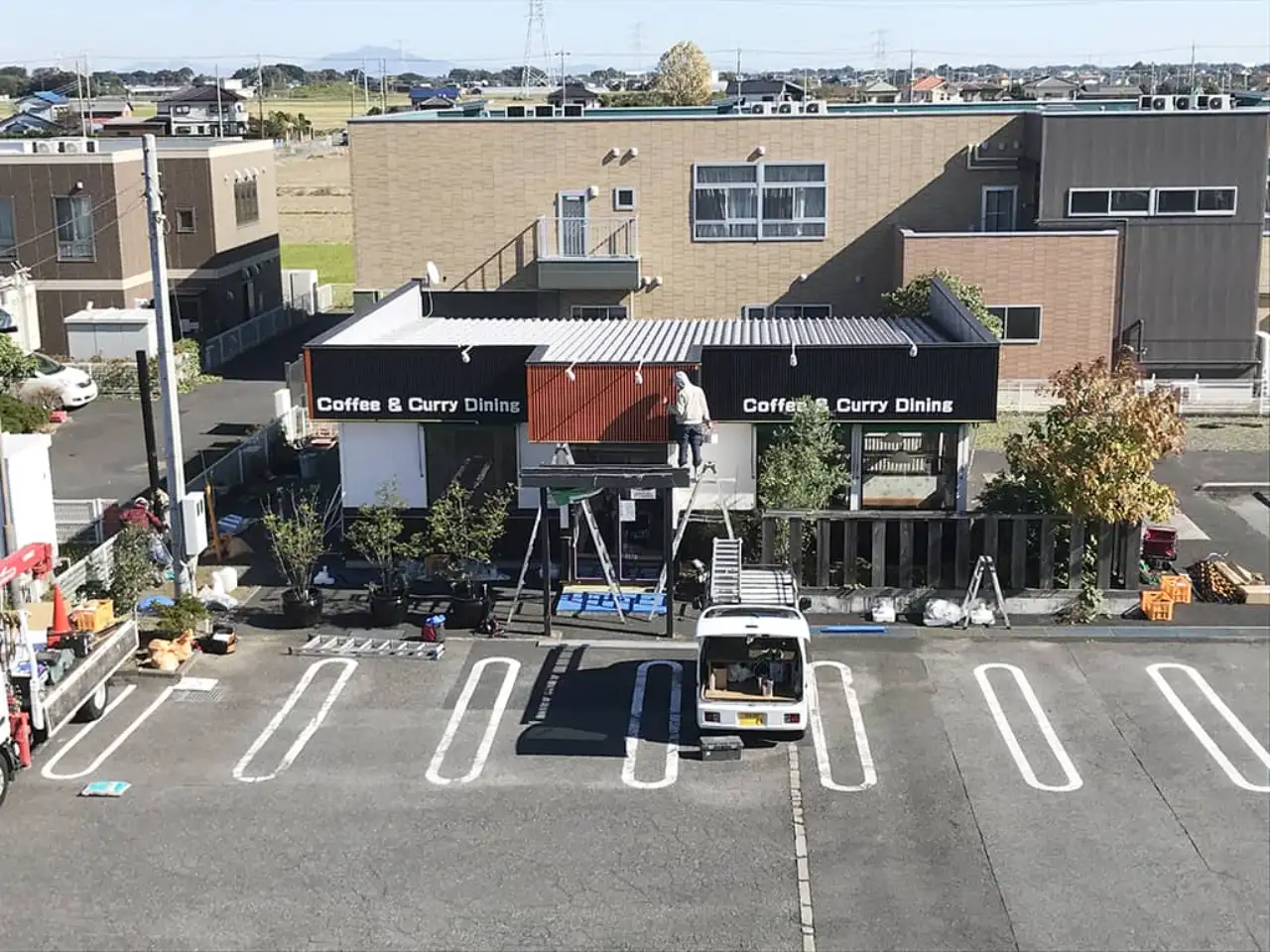 珈琲といんどかれーの店たんぽぽの看板施工風景